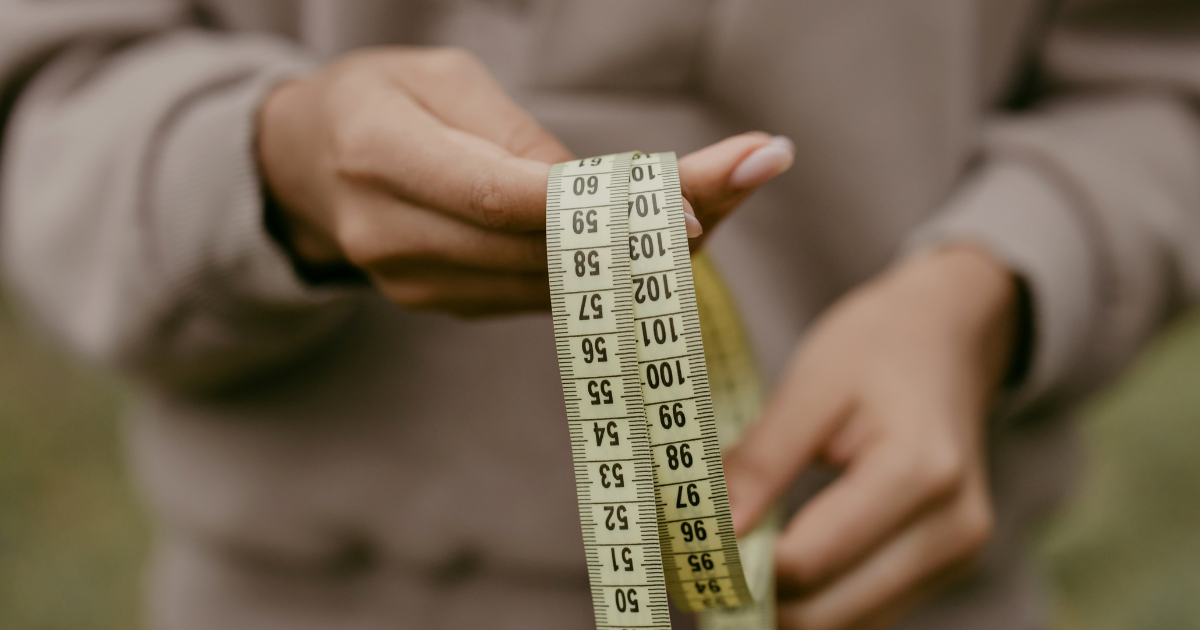 tape measure in hands
